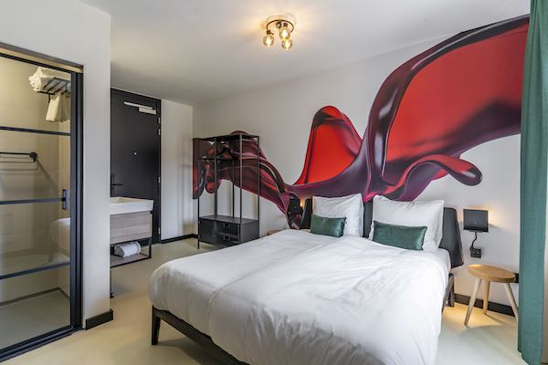 Slaapkamer Comfort Room bij Dormio Wijnhotel Valkenburg